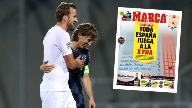 Kane talks with  Modric at the end of the UEFA Nations League football...