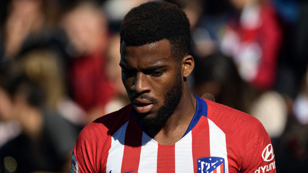 Lemar looks downwards during the match between Leganes and Atletico de...