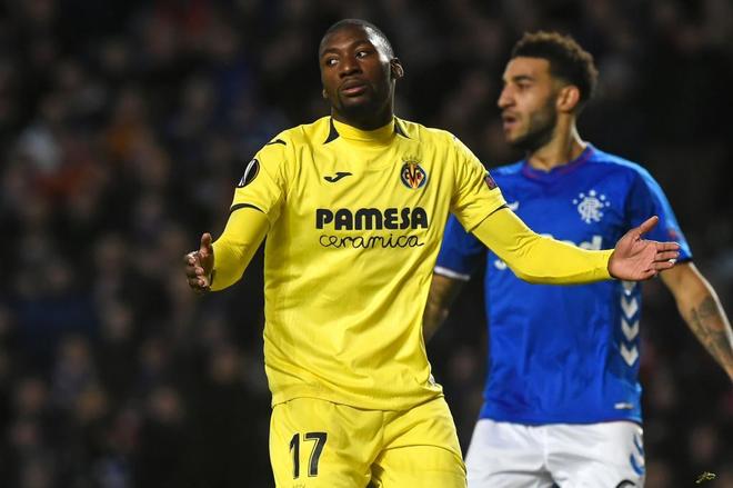 Villarreal&apos;s Cameroonian striker Karl Toko Ekambi reacts after missing...