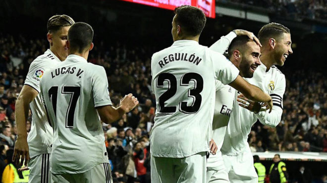 Carvajal celebrates with teammates after scoring a goal during the...
