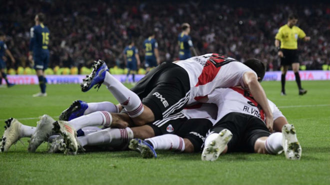 River Plate&apos;s players celebrate a goal.
