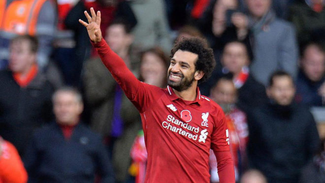 Salah celebra uno de sus goles con el Liverpool en Anfield.