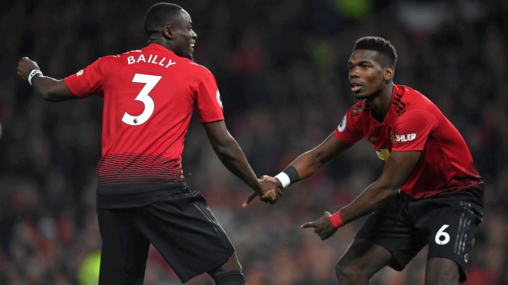 Pogba celebrates with  Bailly after scoring the opening goal against...