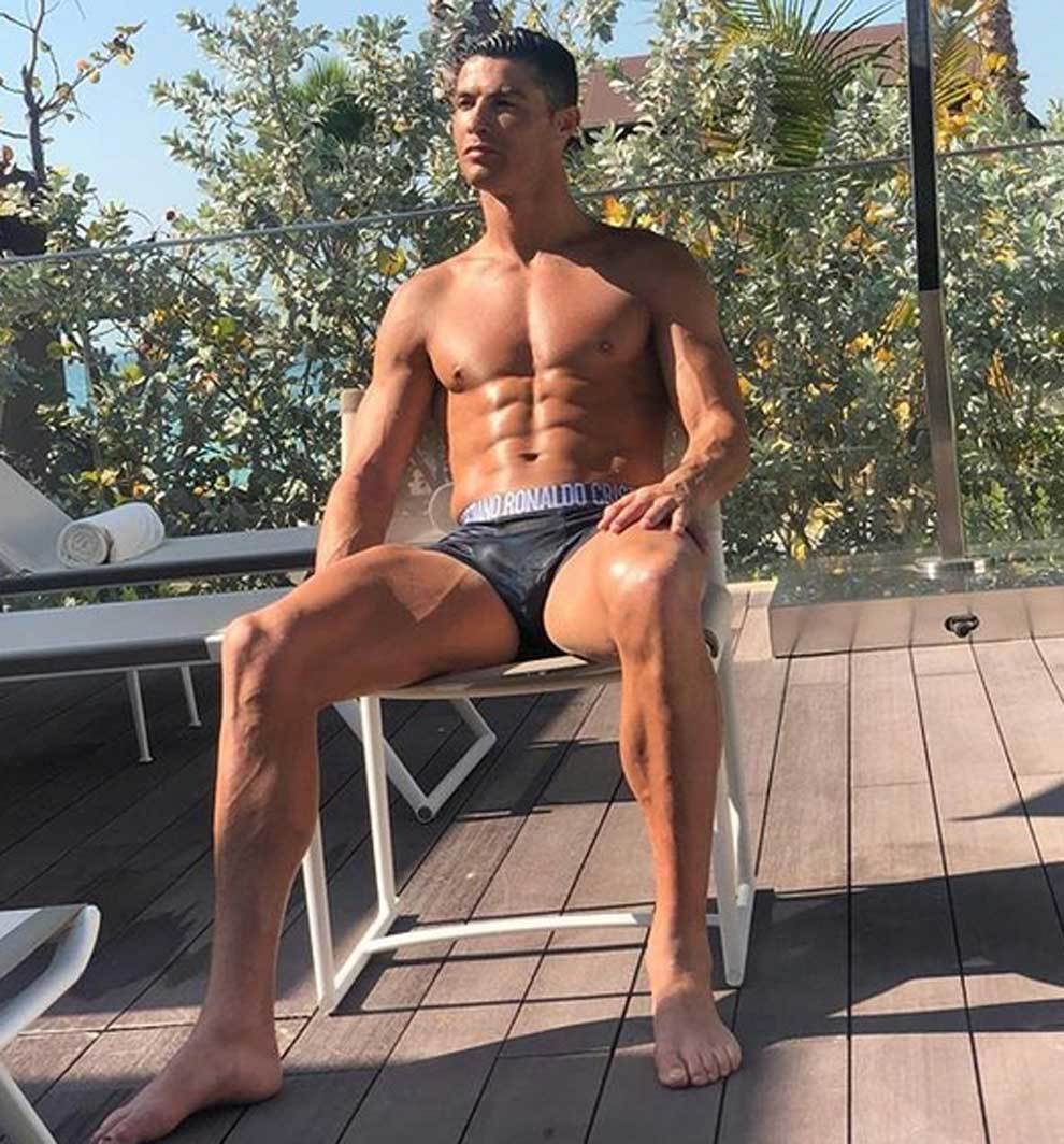 Cristiano Ronaldo posed in a swimwear, showing off is six-pack. While...