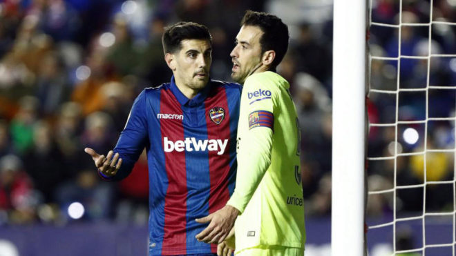 Busquets and Chema in a heated exchange