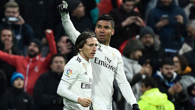 Casemiro celebrates with Luka Modric after scoring a goal