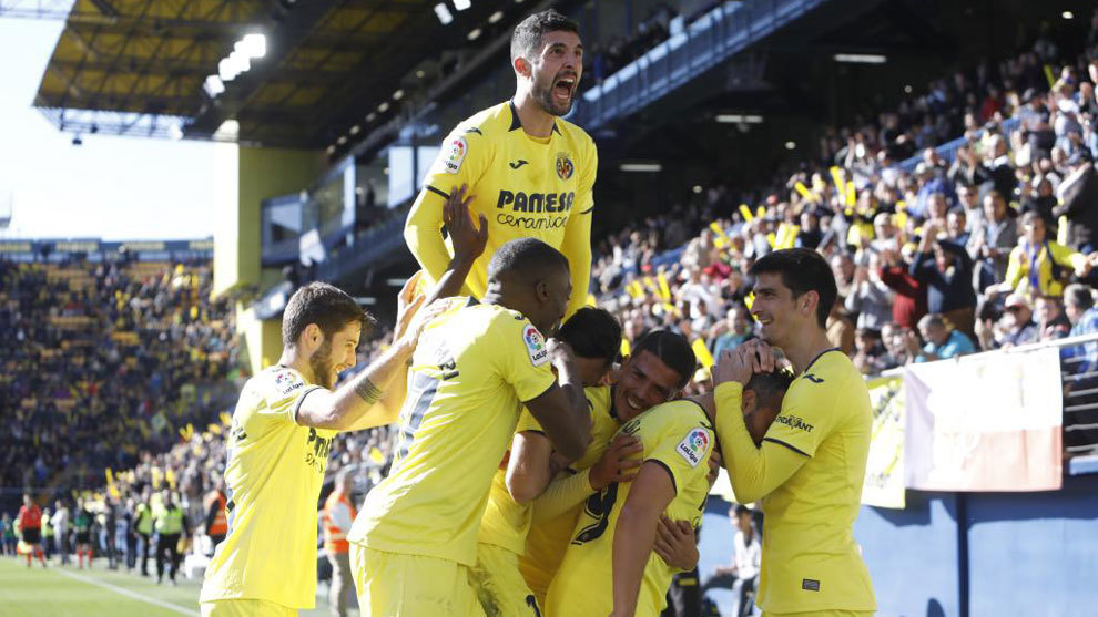 The Villarreal players celebrate a goal at La Ceramica.