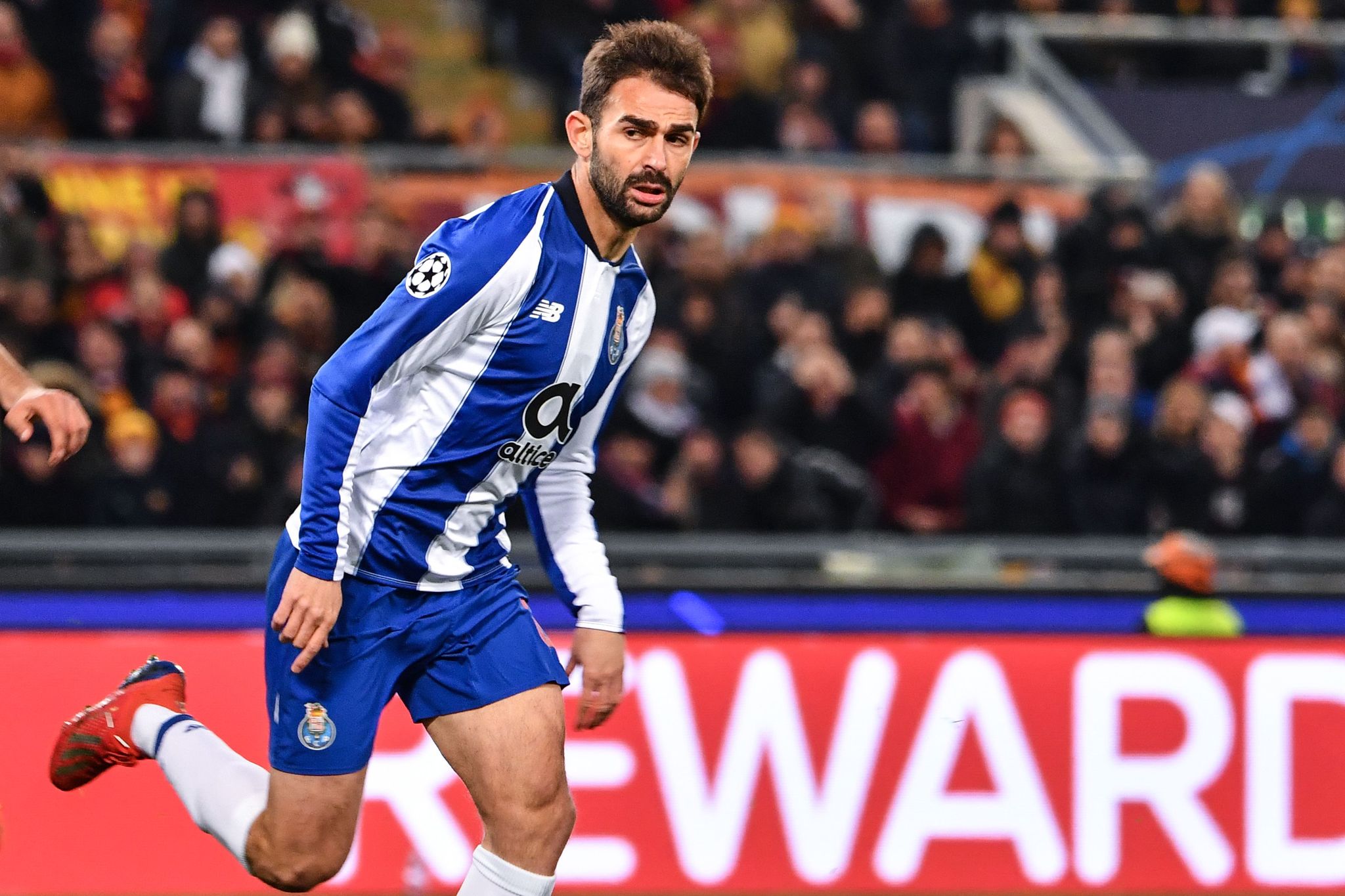 Portos Spanish forward Adrian Lopez celebrates after scoring during the UEFA Champions League round of 16, first leg football match AS Roma vs FC Porto on February 12, 2019 at the Olympic stadium in Rome. (Photo by Alberto PIZZOLI / AFP)