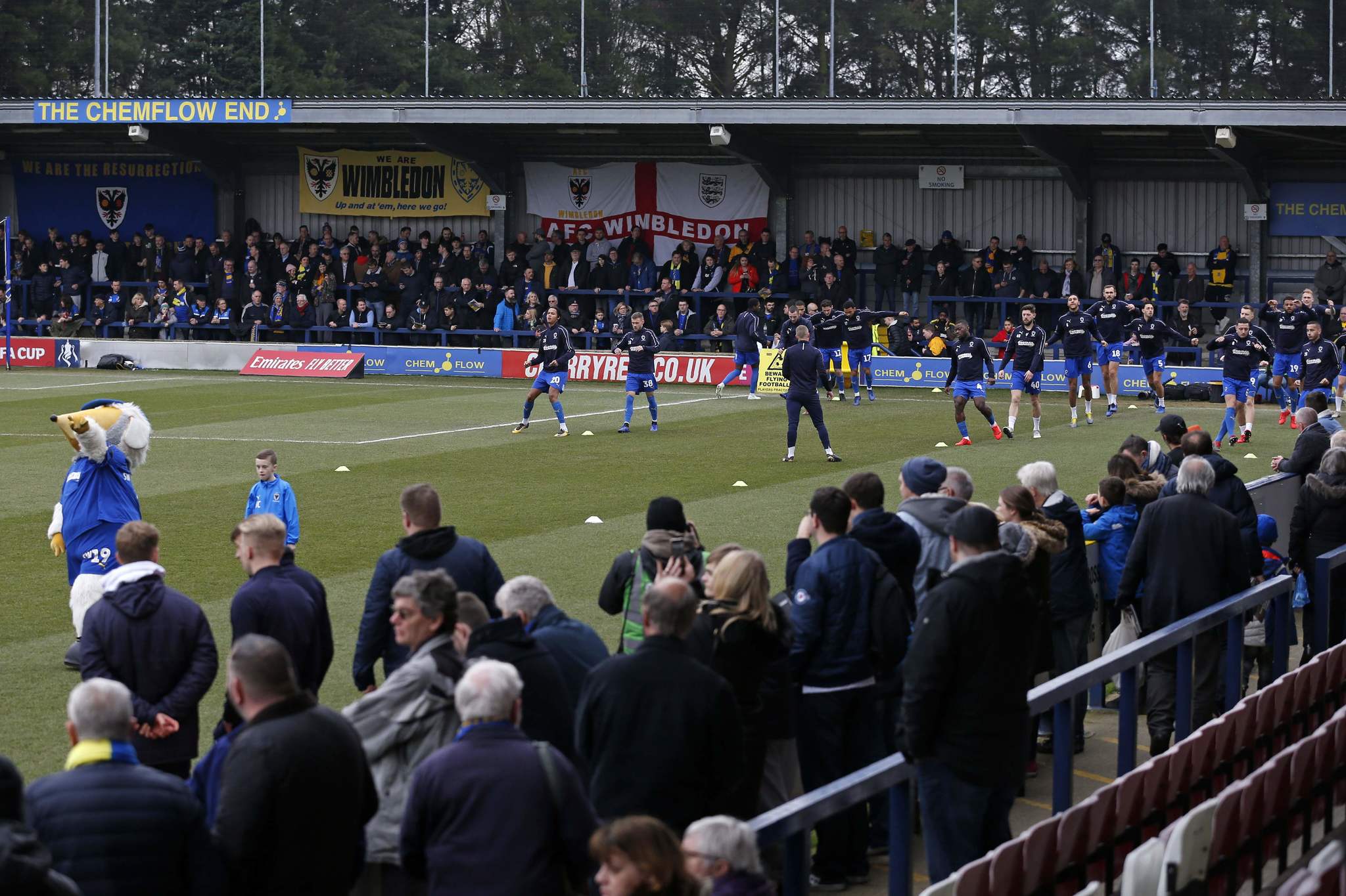 AFC Wimbledon players warm up ahead of the English <HIT>FA</HIT><HIT>Cup</HIT> fifth round football match between AFC Wimbledon and Millwall at The Cherry Red Records stadium in London on February 16, 2019. (Photo by Ian KINGTON / AFP) / RESTRICTED TO EDITORIAL USE. No use with unauthorized audio, video, data, fixture lists, club/league logos or live services. Online in-match use limited to 120 images. An additional 40 images may be used in extra time. No video emulation. Social media in-match use limited to 120 images. An additional 40 images may be used in extra time. No use in betting publications, games or single club/league/player publications. /