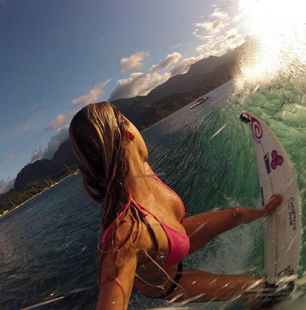 The surfer Alana Blanchard uploads topless photos to social media.