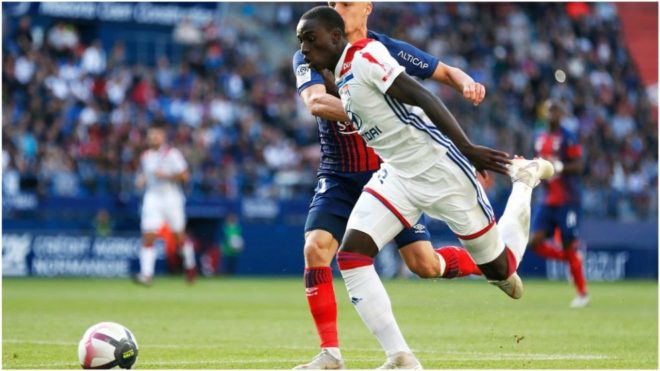 Ferland Mendy getting past Frederic Guilbert of Caen.