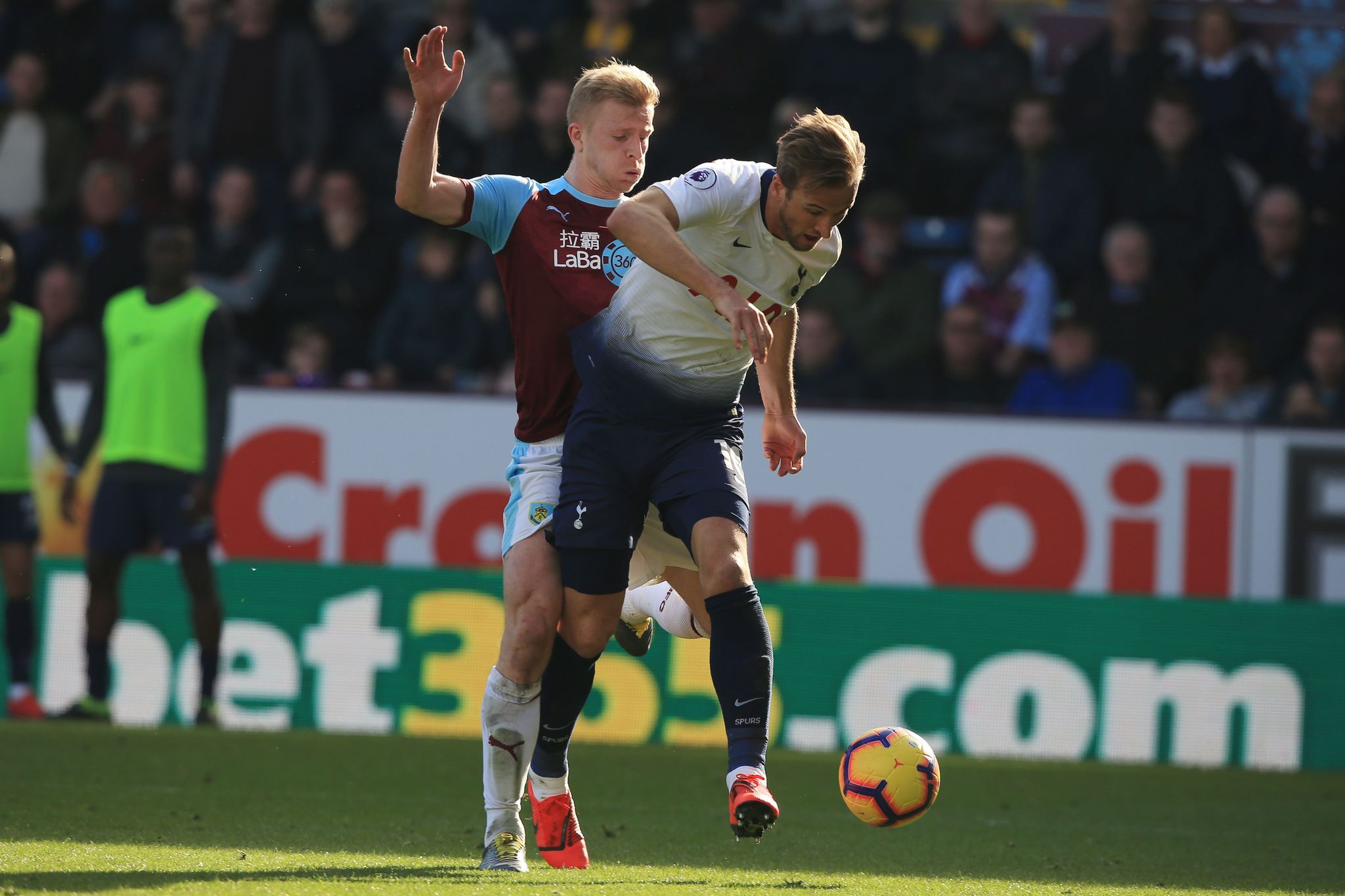 Tottenham Hotspurs English striker Harry <HIT>Kane</HIT> (R) shoots and scores the equaliser during the English Premier League football match between Burnley and Tottenham Hotspur at Turf Moor in Burnley, north west England on February 23, 2019. (Photo by Lindsey PARNABY / AFP) / RESTRICTED TO EDITORIAL USE. No use with unauthorized audio, video, data, fixture lists, club/league logos or live services. Online in-match use limited to 120 images. An additional 40 images may be used in extra time. No video emulation. Social media in-match use limited to 120 images. An additional 40 images may be used in extra time. No use in betting publications, games or single club/league/player publications. /
