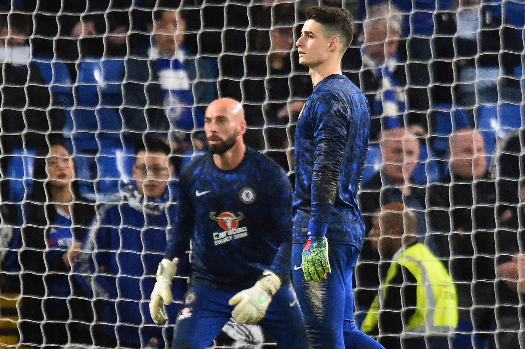 Chelseas Argentinian goalkeeper Willy Caballero (L) and Chelseas Spanish goalkeeper <HIT>Kepa</HIT> Arrizabalaga warm up ahead of the English Premier League football match between Chelsea and Tottenham Hotspur at Stamford Bridge in London on February 27, 2019. (Photo by Glyn KIRK / AFP) / RESTRICTED TO EDITORIAL USE. No use with unauthorized audio, video, data, fixture lists, club/league logos or live services. Online in-match use limited to 120 images. An additional 40 images may be used in extra time. No video emulation. Social media in-match use limited to 120 images. An additional 40 images may be used in extra time. No use in betting publications, games or single club/league/player publications. /