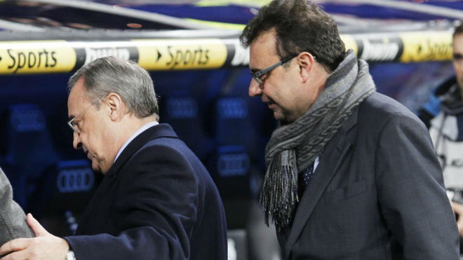 Florentinon Pérez y José Ángel Sánchez, en un entrenamiento del Real Madrid.