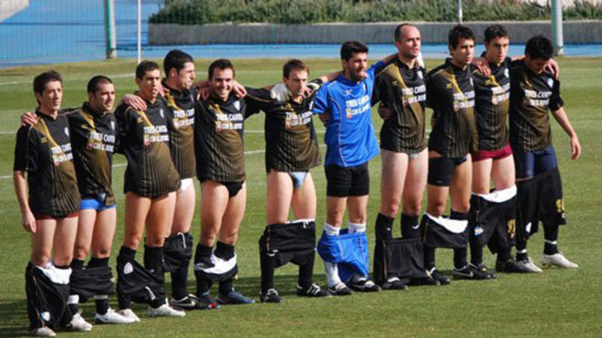 Jaime Mata, the second from the right, pulled his shorts down in...