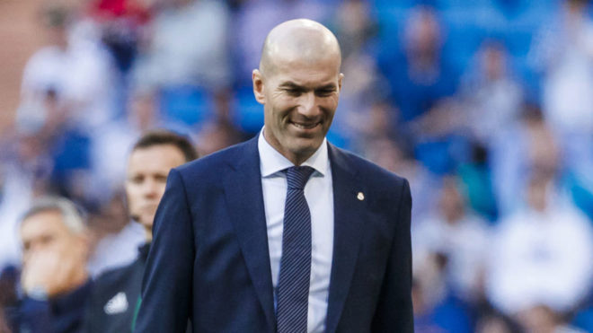 Zidane smiling during the match.