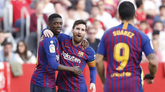 Ousmane Dembele, Lionel Messi and Luis Suarez celebrate
