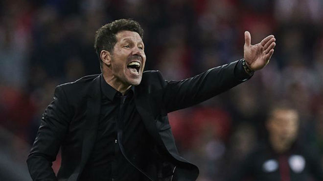 Simeone giving out instructions to his players.
