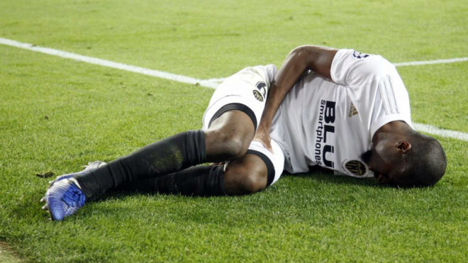 Kondogbia injured on the pitch.