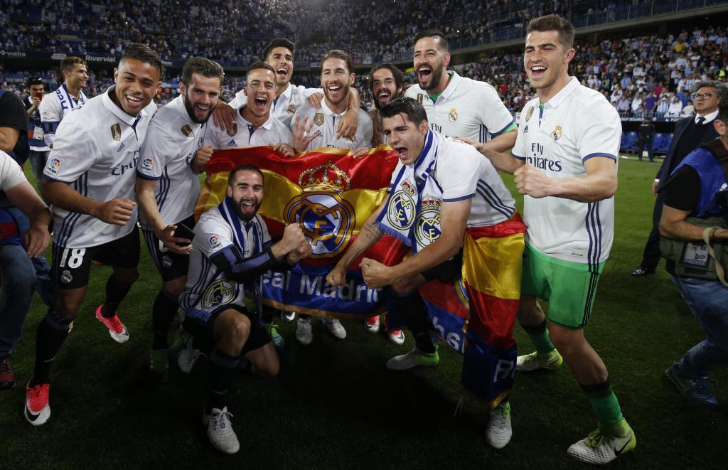 The Real Madrid players celebrate winning LaLiga Santander at Mlaga...
