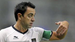 Xavi, en un partido con el Al Saad