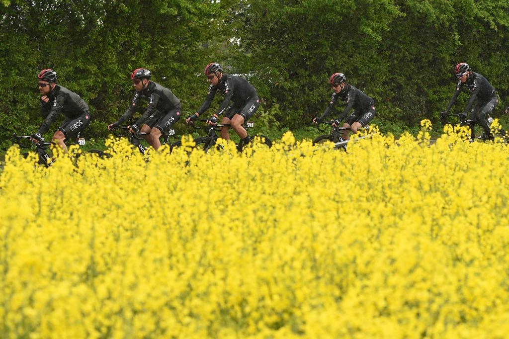 Ineos team riders (L-R) Owain Doull, Chris Lawless, Ian Stannard, Eddie Dunbar and Chris Froome ride beside a field of rapeseed during the first stage of the Tour de <HIT>Yorkshire</HIT> near Beverley in northern England on May 2, 2019. (Photo by Oli SCARFF / AFP)