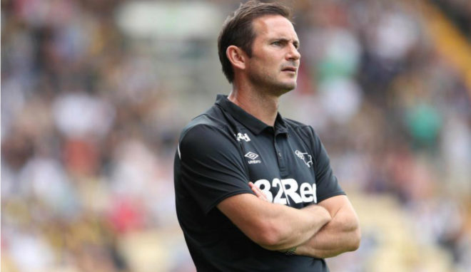 Frank Lampard overseeing a Derby County match.