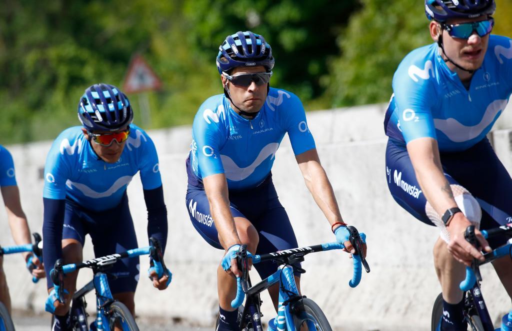 Team Movistar rider Spains Mikel <HIT>Landa</HIT> (C) rides flanked by his teammates during the stage four of the 102nd Giro dItalia - Tour of Italy - cycle race, 235kms from Orbetello to Frascati on May 14, 2019. (Photo by Luk BENIES / AFP)