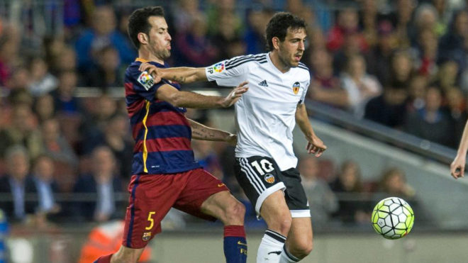 Dani Parejo and Sergio Busquets during a clash between Valencia and...