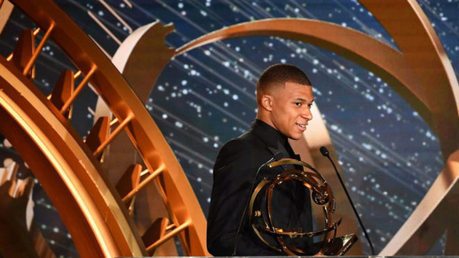 Kylian Mbappe receiving the Ligue 1 Player of the Year award.