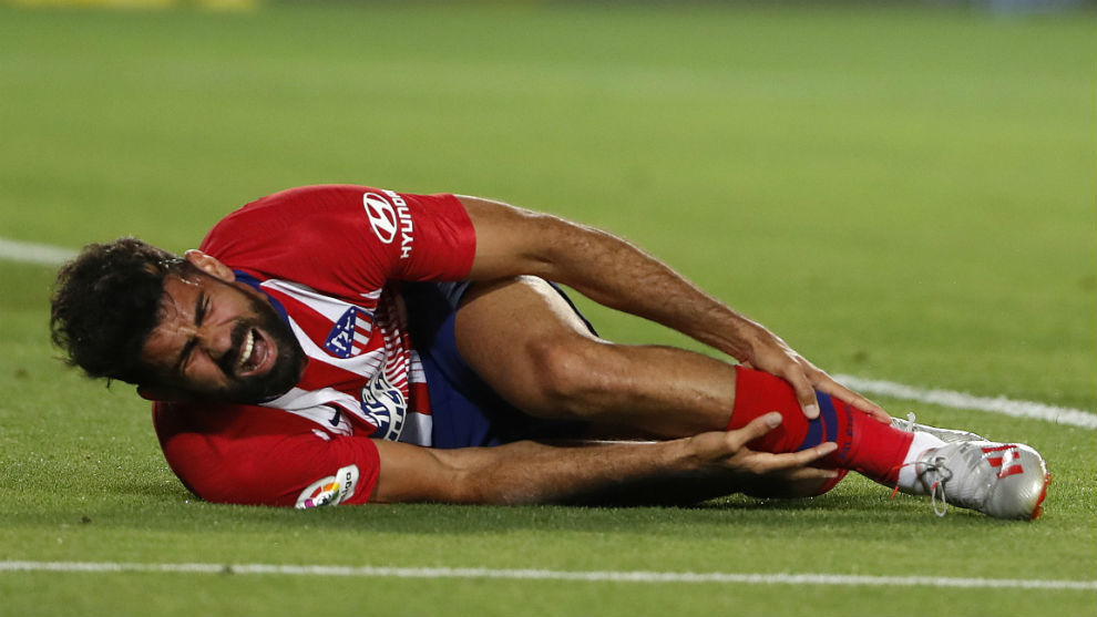 Diego Costa on the ground after suffering the injury.