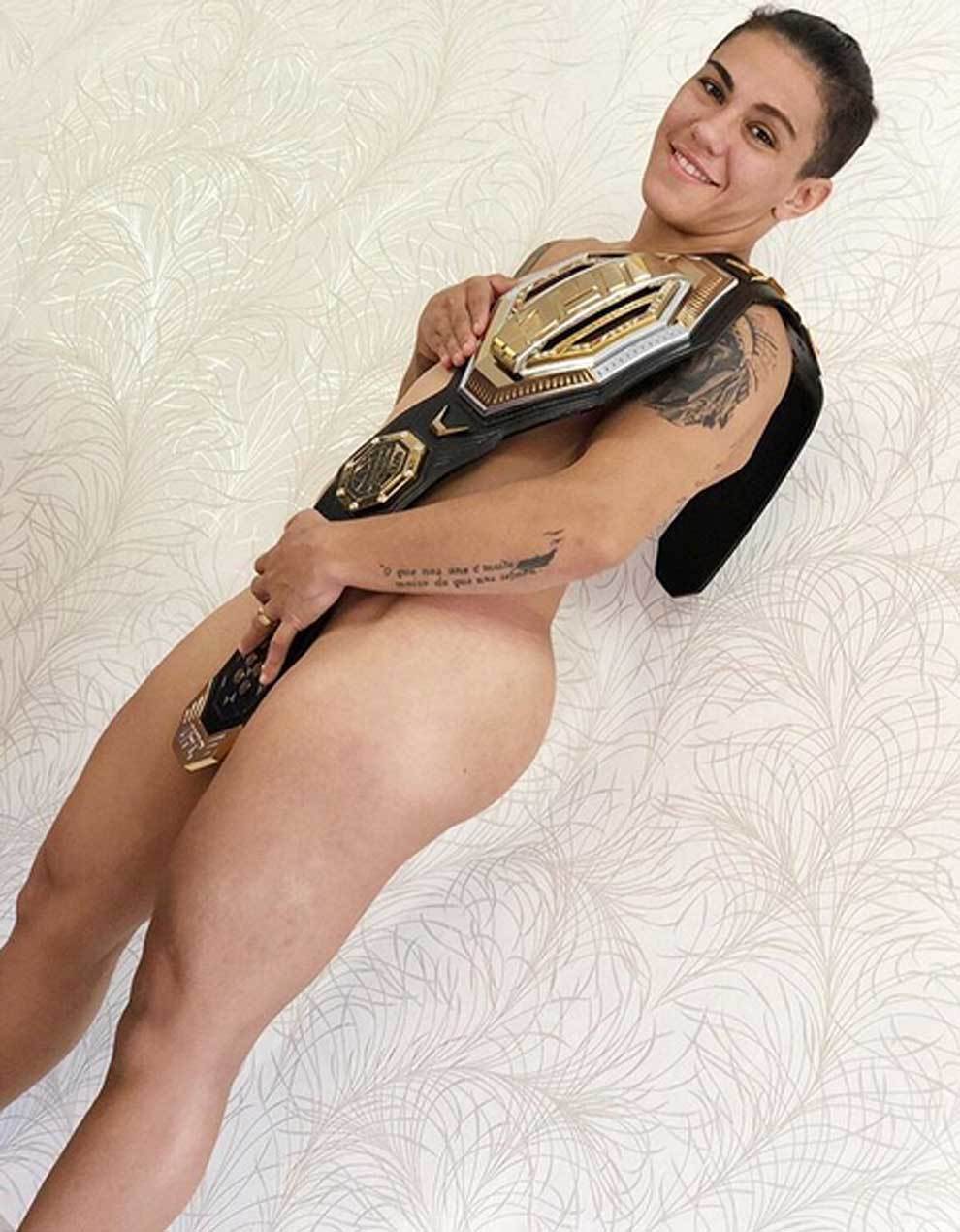 After being crowned UFC straw-weight champion, Jessica Andrade celebrated h...