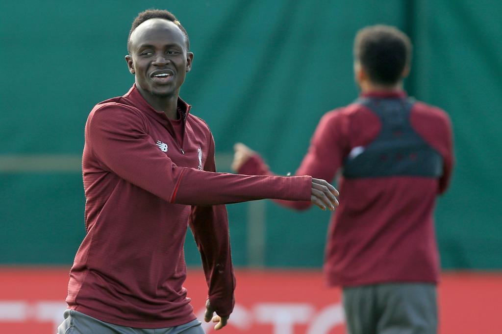 Liverpools Senegalese striker Sadio <HIT>Mane</HIT> (L) takes part in a team training session at Melwood in Liverpool, north west England on May 6, 2019, on the eve of their UEFA Champions League semi-final second leg football match against Barcelona. (Photo by Lindsey PARNABY / AFP)