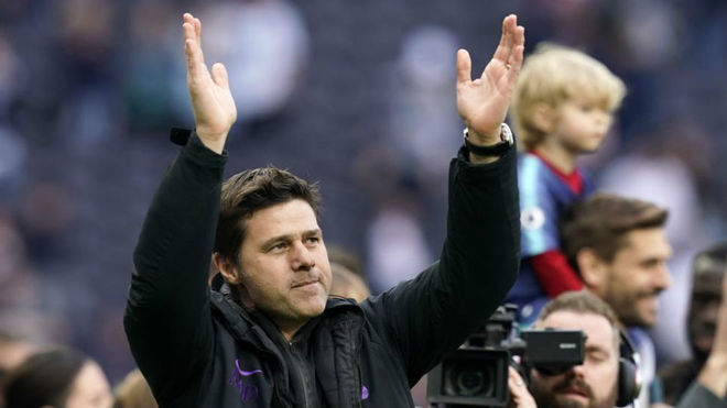 Mauricio Pochettino greeting Spurs&apos; supporters after their recent...