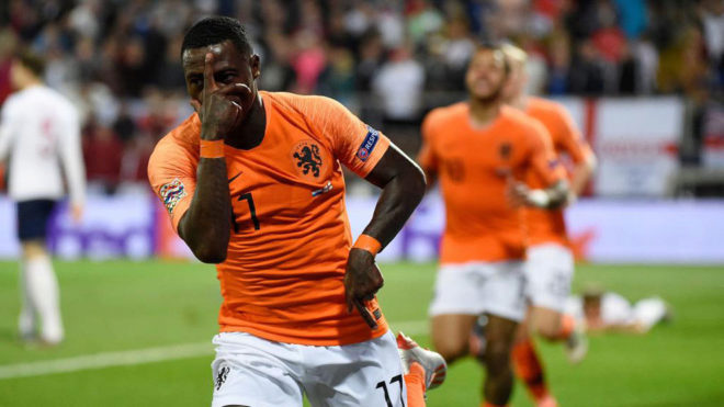 Quincy Promes celebrates his goal against England.