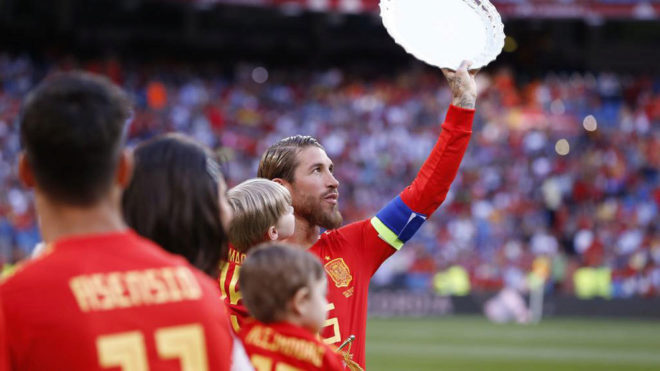 Sergio Ramos receives a plaque after breaking the record for wins.