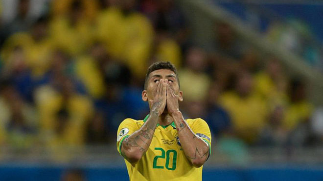Roberto Firmino cannot believe his luck after missing a chance against...