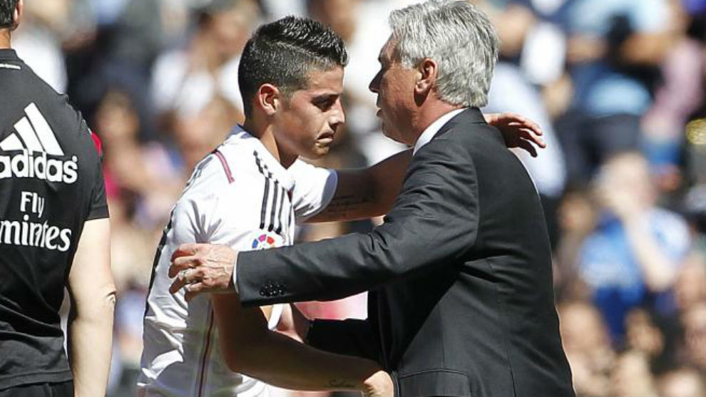 James Rodriguez hugging Carlo Ancelotti during their time together at...