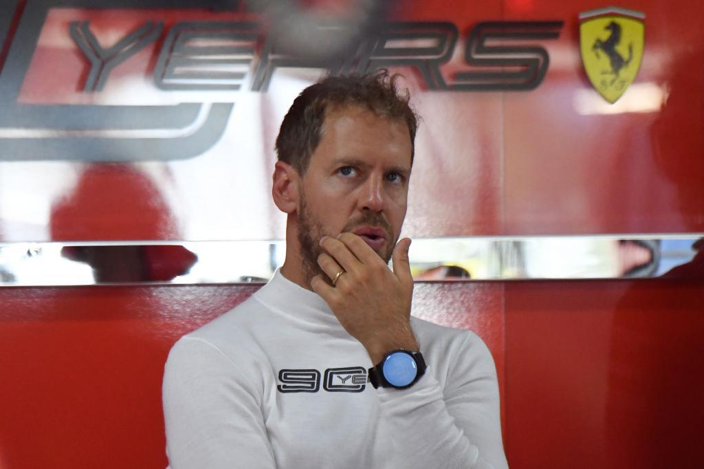 Ferraris German driver Sebastian <HIT>Vettel</HIT> looks on in the pits during the first practice session at the Circuit Paul Ricard in Le Castellet, southern France, on June 21, 2019, ahead of the Formula One Grand Prix de France. (Photo by CHRISTOPHE SIMON / AFP)