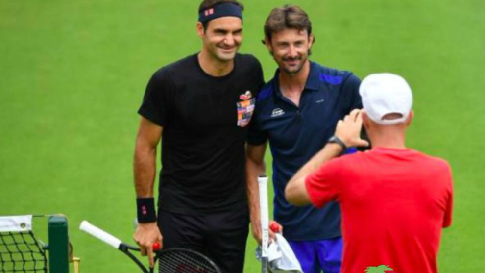 Federer y Ferrero se fotografan antes de la sesin