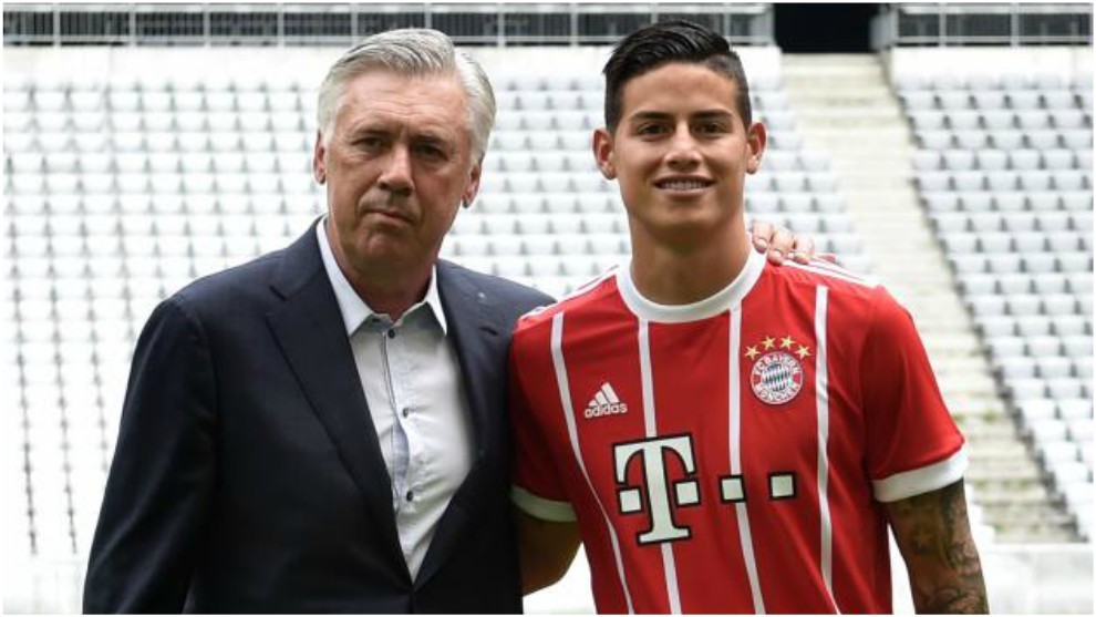 Carlo Ancelotti poses alongside James Rodriguez at the Colombian&apos;s...