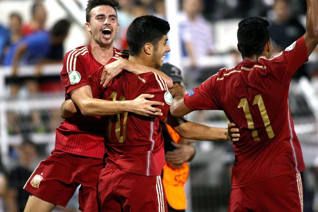 Spains players celebrate after winning the UEFA 2015 European U-19 Championship semi-final match between France and Spain at Municipal Stadium in <HIT>Katerini</HIT>, Greece, on July 16, 2015. AFP PHOTO / STRINGER