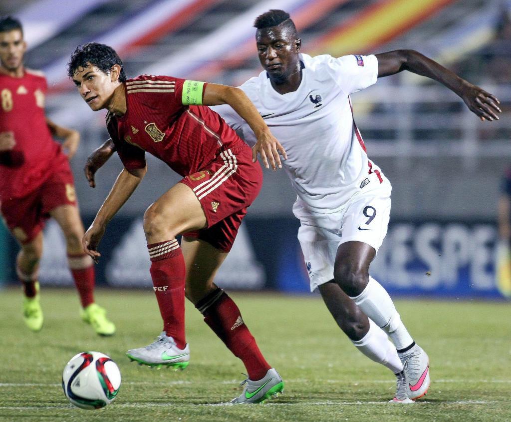 Sehrou Guirassy (L) of France and Jesus Vallejo (R) of Spain vie for the ball during the UEFA 2015 European U-19 Championship semi-final match between France and Spain at Municipal Stadium in <HIT>Katerini</HIT>, Greece, on July 16, 2015. AFP PHOTO / STRINGER