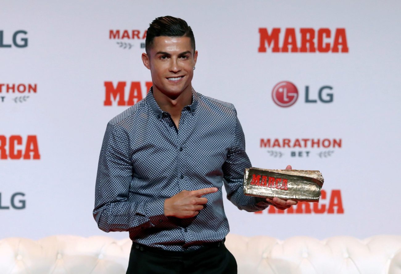 Cristiano ronaldo with his marca legend award | MARCA English