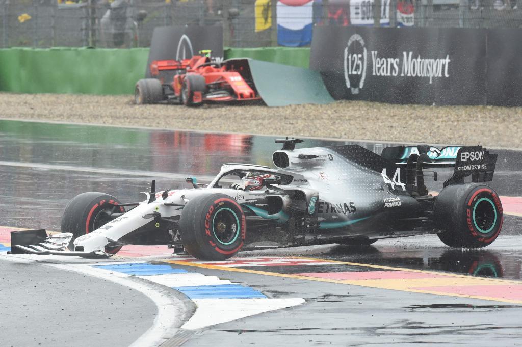 TOPSHOT - Mercedes British driver Lewis <HIT>Hamilton</HIT> (Front) and Ferraris Monegasque driver Charles Leclerc crush during the German Formula One Grand Prix at the <HIT>Hockenheim</HIT> racing circuit on July 28, 2019 in <HIT>Hockenheim</HIT>, southern Germany. (Photo by Christof STACHE / AFP)