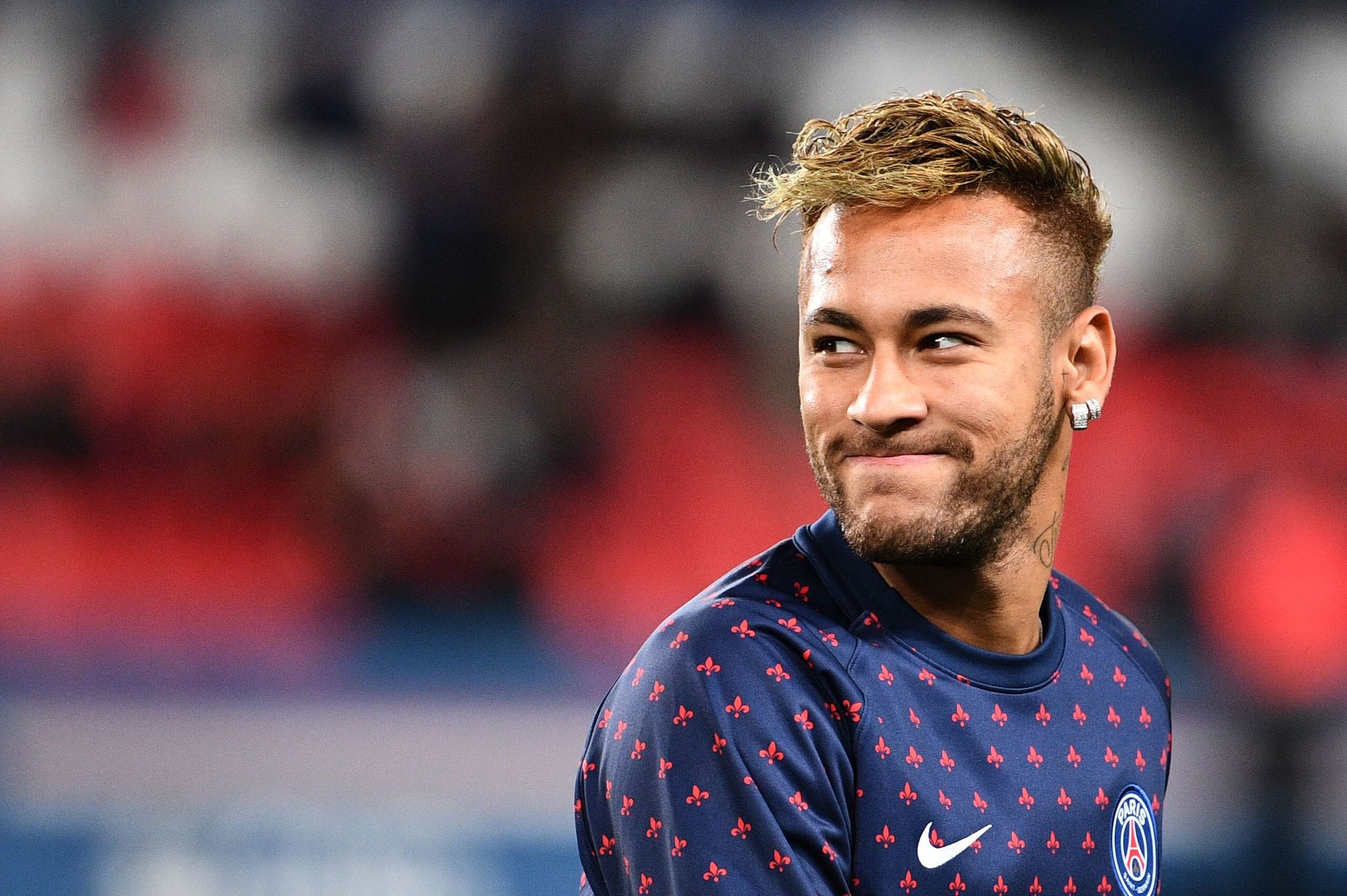 (FILES) In this file photo taken on October 07, 2018 Paris Saint-Germains Brazilian forward <HIT>Neymar</HIT> smiles during warm up prior to the French L1 football match between Paris Saint-Germain (PSG) and Olympique de Lyon (OL) at the Parc des Princes stadium in Paris. A Brazilian judge on August 9, 2019 dismissed the rape case against footballer <HIT>Neymar</HIT> citing insufficient evidence, court sources told AFP. - The decision -- the final episode in the rape case against the Brazilian international superstar -- comes on the recommendations of prosecutors just over a month after police dropped the case citing lack of evidence. (Photo by FRANCK FIFE / AFP)