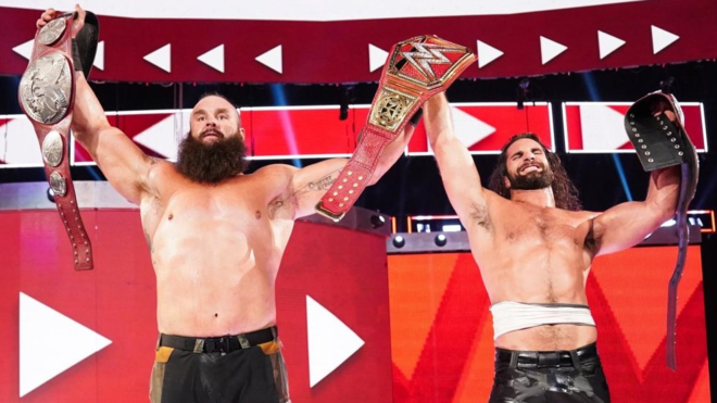 Seth Rollins & Braun Strowman celebrando con los cinturones