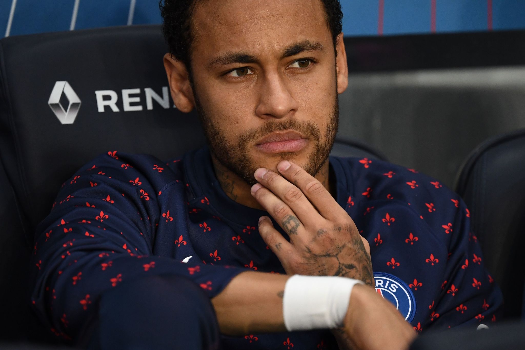 (FILES) In this file photo taken on April 21, 2019 Paris Saint-Germains Brazilian forward <HIT>Neymar</HIT> looks on during the French L1 football match between Paris Saint-Germain (PSG) and Monaco (ASM) at the Parc des Princes stadium in Paris. - <HIT>Neymar</HIT> will not feature in Paris Saint-Germains last two games of their pre-season tour of Asia, French media reported on July 28, 2019. He will also miss the French Champions Trophy against Rennes in Shenzhen on August 3, 2019 as he completes a six-match domestic ban for an incident involving a fan the last time the teams met, in the French Cup final. (Photo by Anne-Christine POUJOULAT / AFP)