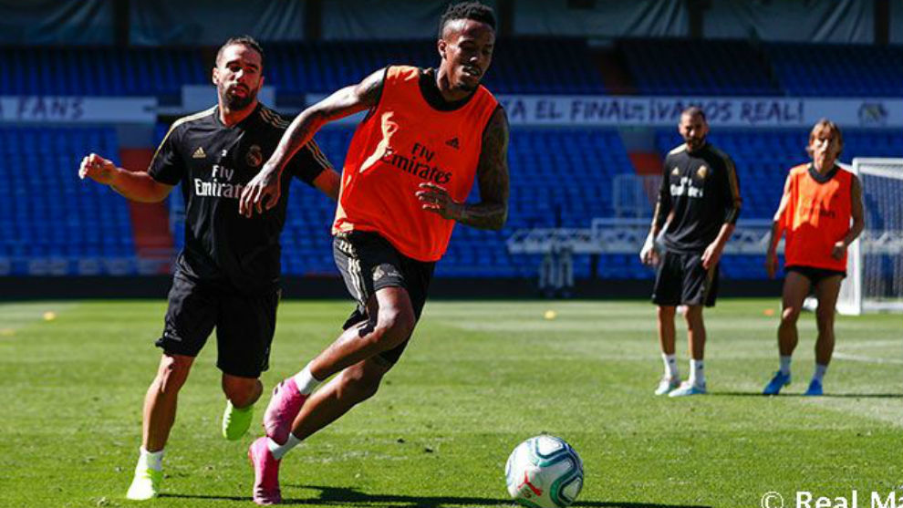 Eder Militao and Dani Carvajal during Real Madrid&apos;s training session...