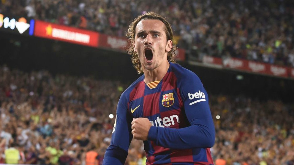Antoine Griezmann celebrates one of his goal against Real Betis.